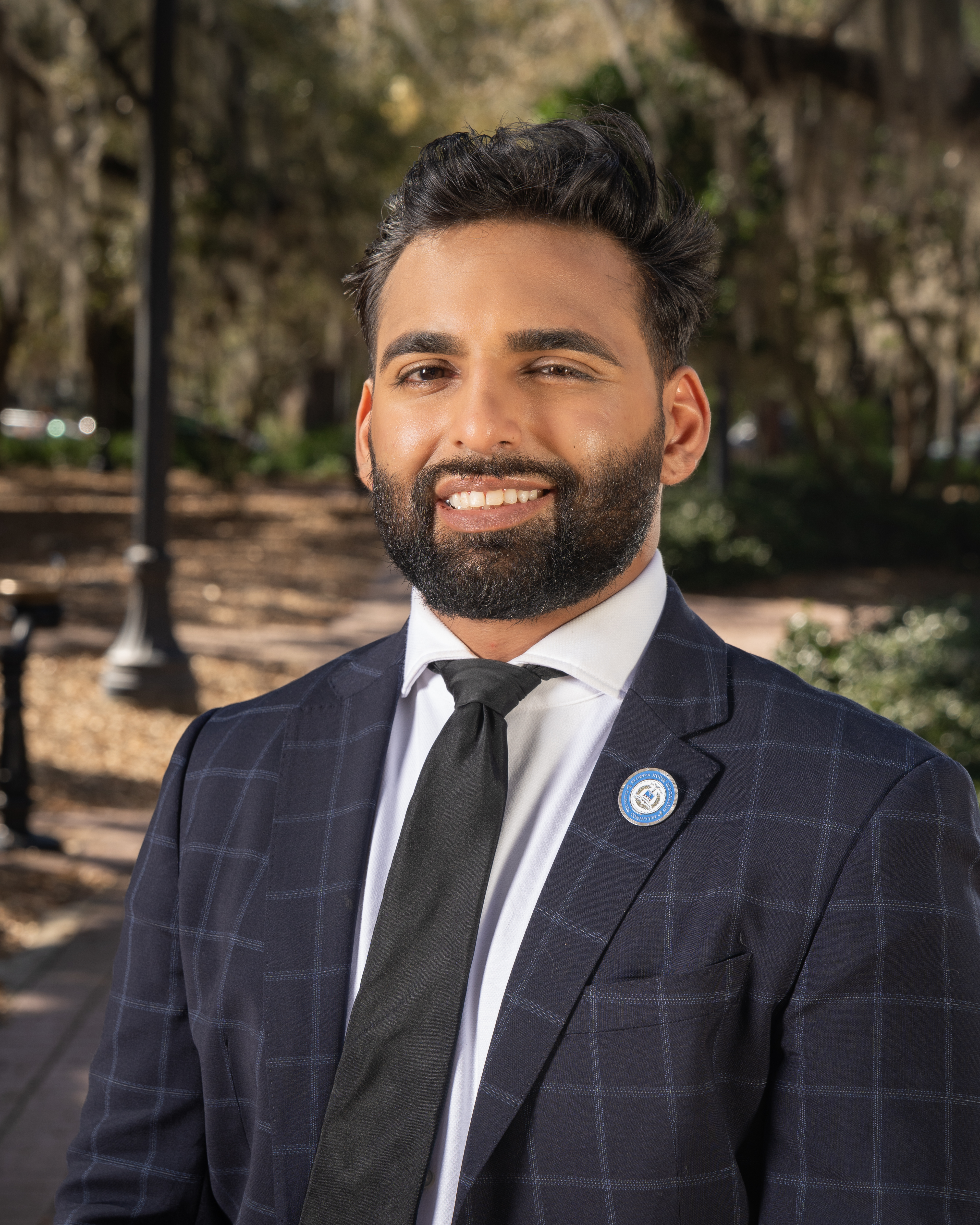 Headshot of Mahdi Kassam