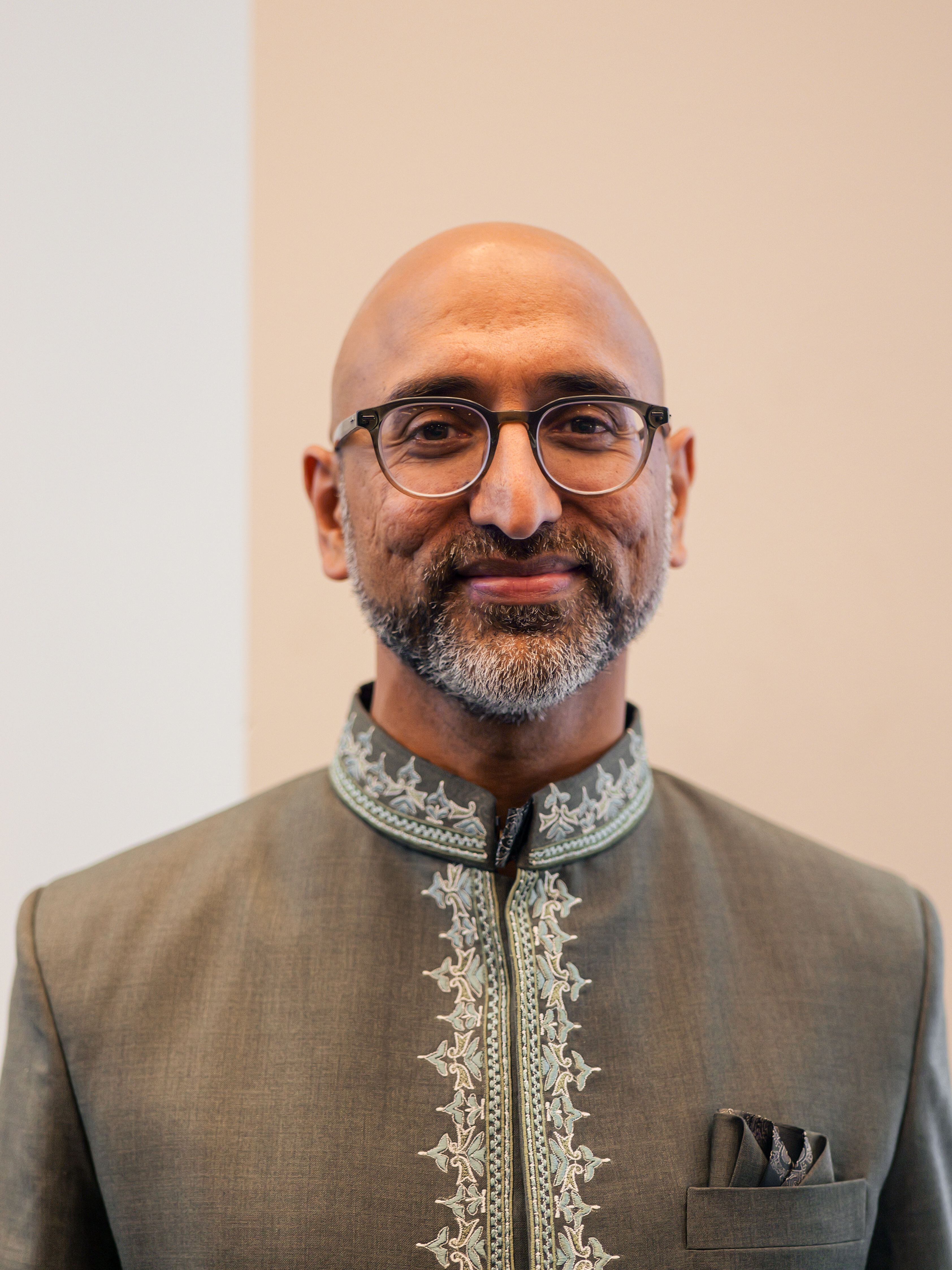 Headshot of Khizer Husain